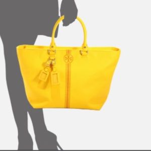 TORY BURCH. Yellow Leather Pebbled Roslyn bag w/ stripes & a logo accent.